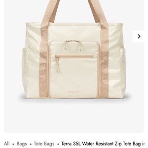 Calpak Terra 35L water resistant zip tote bag in white sands